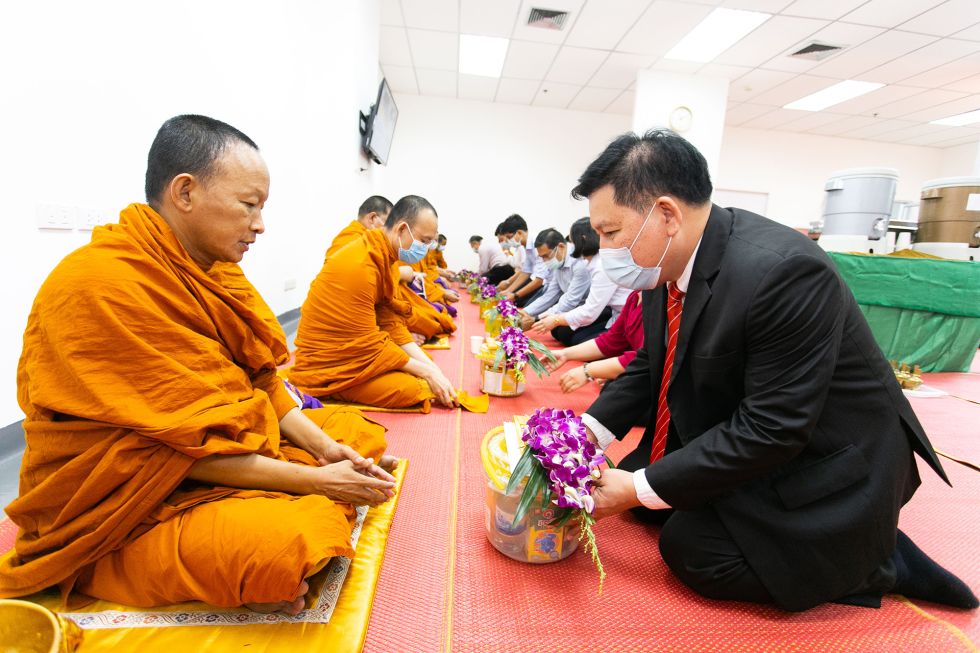 Blessing ceremony ended, the monks get meals and gifts in return.